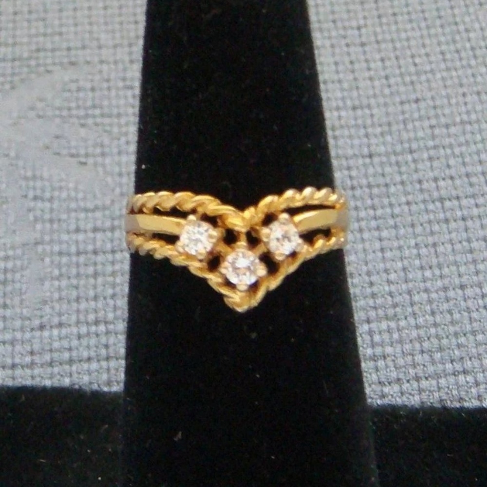 English 9 karat yellow gold .31 carat ring. Size 5